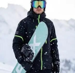 Närbild på åkare med skidglasögon och snowboard, framtagen med AI